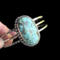 holding tilted front view chunky everyday turquoise bracelet, sterling silver and stamped